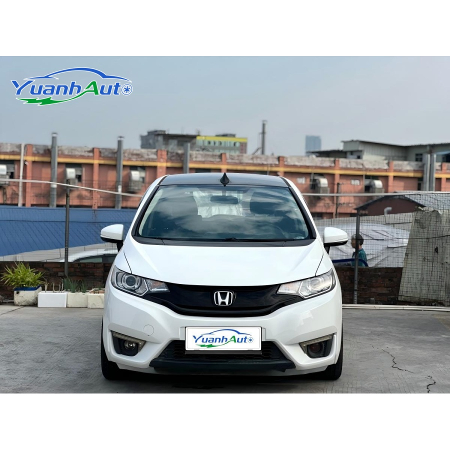 Honda Fit d'occasion, modèle 2015, 1.5L LX CVT, voiture confort à deux compartiments, au meilleur prix.
