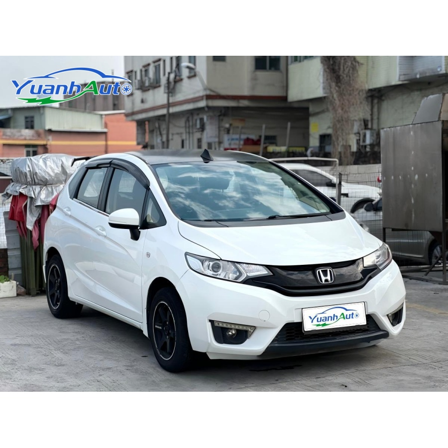 Honda Fit d'occasion, modèle 2015, 1.5L LX CVT, voiture confort à deux compartiments, au meilleur prix.